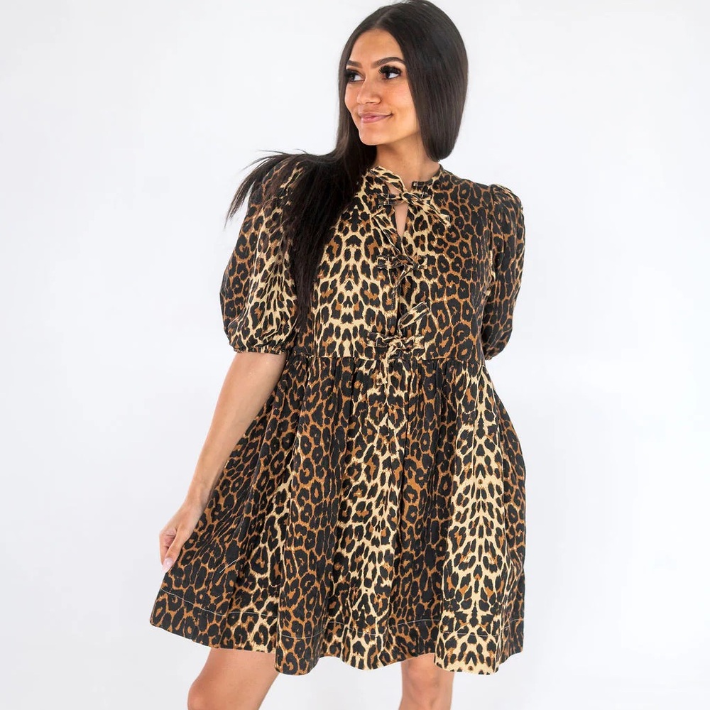 Leopard Print Puff Sleeve Dress with bow tie front accent.